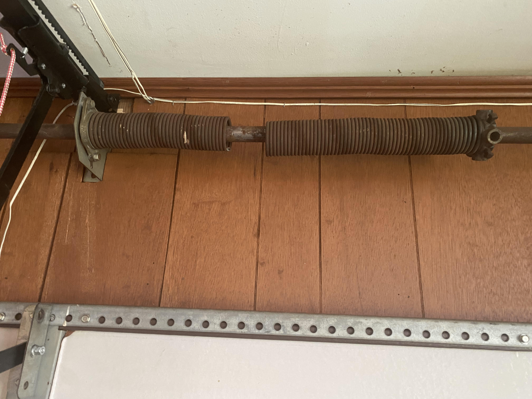 5 Warning Signs Your Garage Door Spring Needs Replacement - garage door maintenance guide